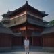 黄建国，香港六合彩资讯平台合规顾问，成熟男士正装照，表情严谨专业